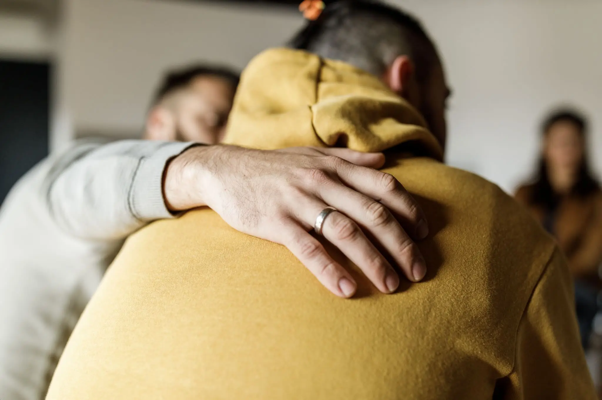 a person hugging a person